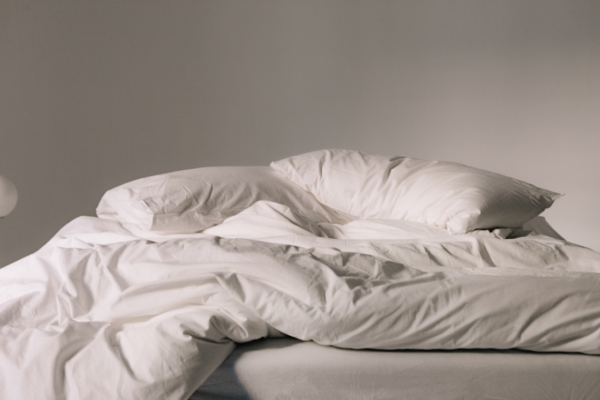 Why You'Re Tired But Can’t Sleep 3 Image Of Messy Bed Poor Sleep Routine